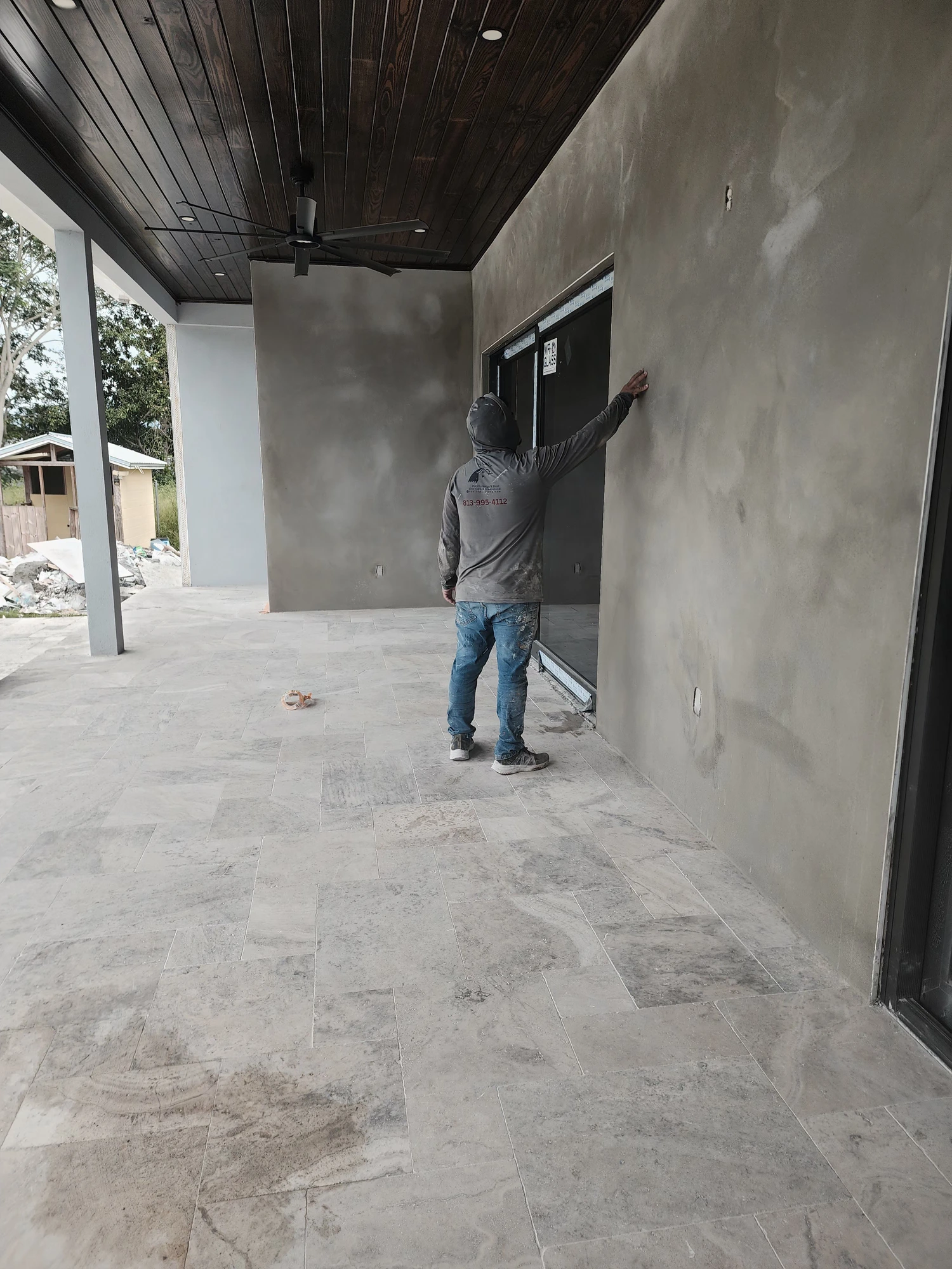 Finished stucco walls in covered lanai — Tampa FL exterior painting project