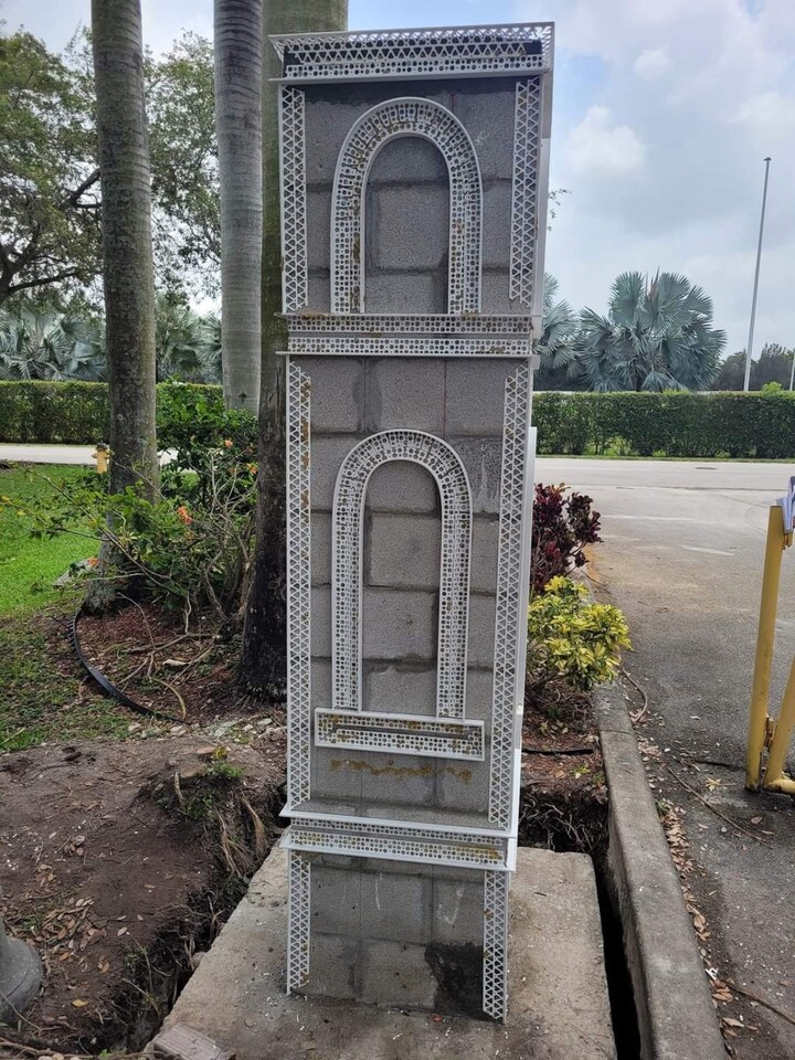 Decorative entry column wrapped with vinyl corner beads and mesh, ready for stucco molding rebuild in Tampa, FL — H Calix Stucco Design & Paint LLC.